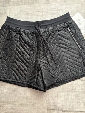 Athleta quilted lined shorts. New with tags. Purchased and too big for me.